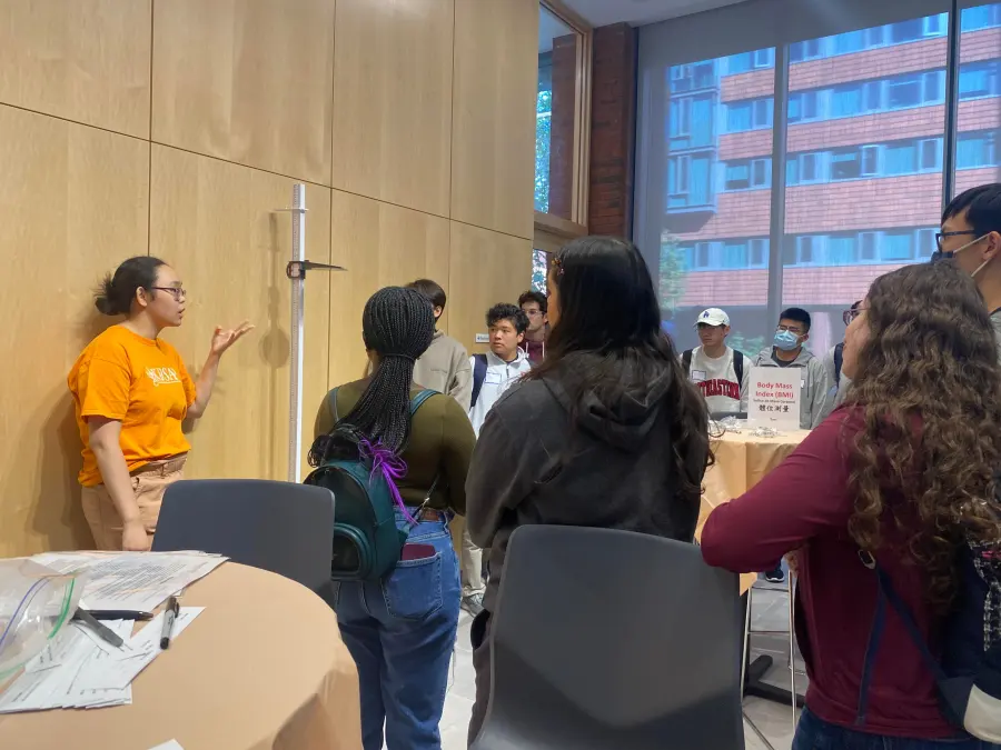 A Penn KDSAP volunteer leads a training discussion